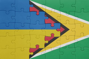 Guyana 'nın renkli ulusal bayrağı ve Ukrayna bayrağı. konsept