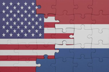 Hollanda 'nın renkli ulusal bayrağı ve Amerika Birleşik Devletleri bayrağının bulmacası. konsept