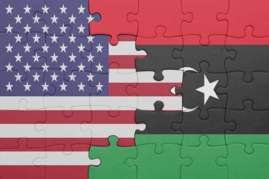 Libya 'nın renkli ulusal bayrağı ve Amerika Birleşik Devletleri bayrağı ile bulmaca. konsept