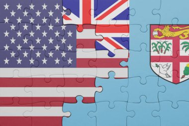 Fiji 'nin renkli ulusal bayrağı ve Amerika Birleşik Devletleri bayrağı ile bulmaca. konsept