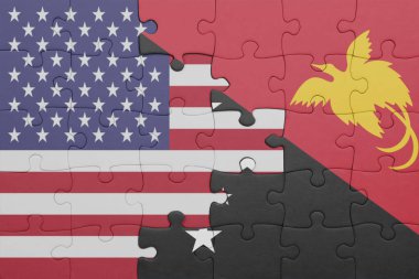 Papua Yeni Gine 'nin renkli ulusal bayrağı ve Amerika Birleşik Devletleri bayrağı. konsept