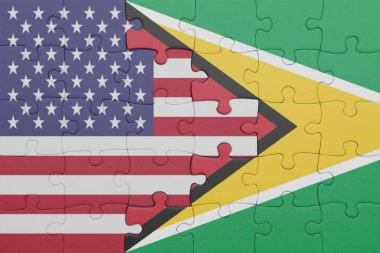 Guyana 'nın renkli ulusal bayrağı ve Amerika Birleşik Devletleri bayrağı bulmacası. konsept