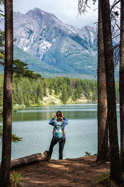 Hiker Girl Taking Pictures Johnson Lake Banff National Park Alberta — Stock Photo, Image