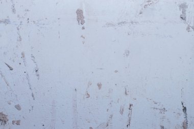 Rengin açık tonlarında eski bir duvar