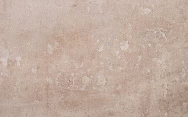 Rengin açık tonlarında eski bir duvar