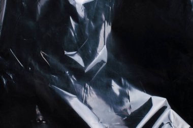 doku buruşmuş polietilen koyu renk arkaplan