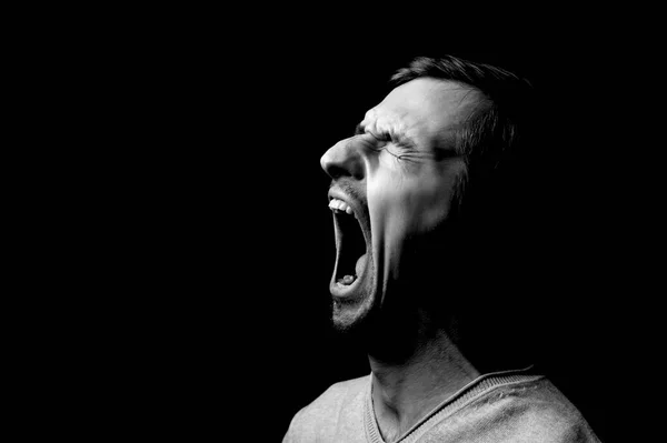 stock image photo portrait of a guy on a black background