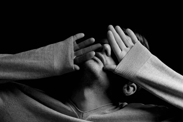 Man Black Background Covers His Face His Hands — Stock Photo, Image