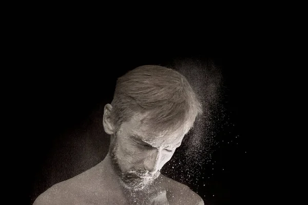 stock image portrait of a guy in white powder