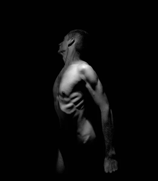 black and white photo, half-naked guy