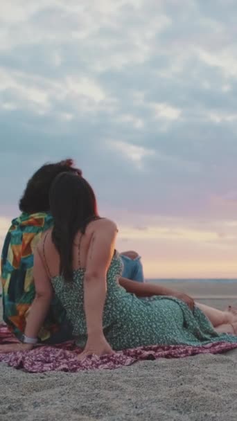 Vertical Video Romantic Couple Relaxing Enjoying Beach Looking Sunrise Back — Stock Video