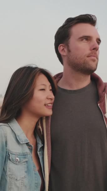 Vertical Video Cute Couple Stands Hugging Beach — Stock Video