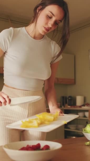 Vertical Video Young Woman Preparing Salad Home Kitchen — Stock Video