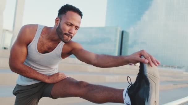 Young Bearded Male Athlete Doing Warm Stretching Legs Training While — Vídeos de Stock