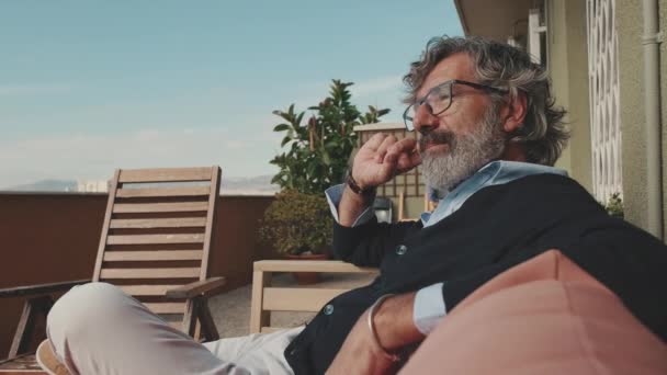 Mature Man Enjoying Sunny Weather Balcony — Stockvideo