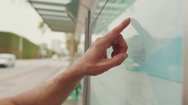 Close Unrecognizable Man Hand Pointing Finger Searching Public Transport Traffic — Stok Video