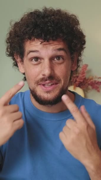 Guy Talking Video Call Using Laptop Waving His Hand Greeting — Stock Video