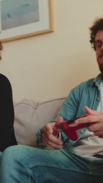 Two Guys Playing Games Console Together — Stock Video