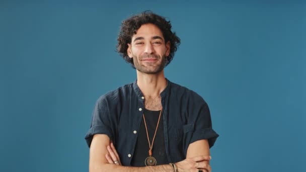 Smiling Man Showing Thumbs Looking Camera Isolated Blue Background Studio — Stock Video