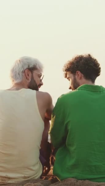 Gay Couple Love Spend Time Together Sitting Beach Dog Back — Stock Video