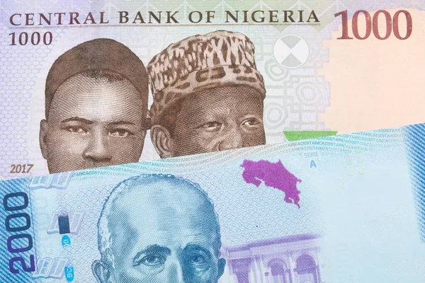 나이지리아 푸른색 보라색 초록색 000 나이르 모양의 지폐와 코스타리카 로부터 — 스톡 사진