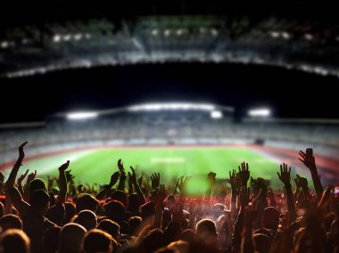 Futbol ya da futbol taraftarları stadyumdaki bir maçta