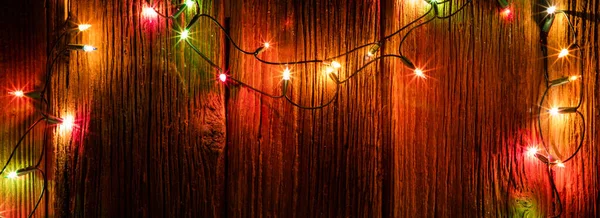 Χριστουγεννιάτικα Φωτάκια Και Διακοσμήσεις Φόντο Ξύλινη — Φωτογραφία Αρχείου
