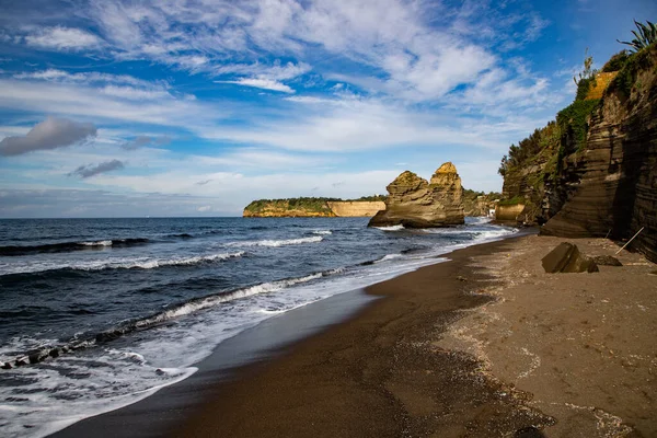 stock image rock formations on the beach Procida island