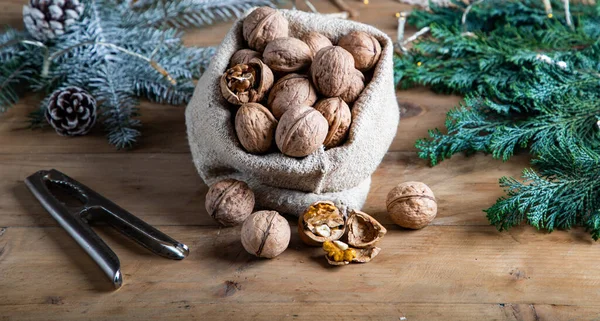 Festive Christmas Nuts Tumbling Burlap Bag — Stock Photo, Image
