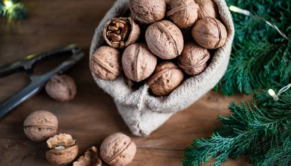 Festive Christmas Nuts Tumbling Burlap Bag — Stock Photo, Image