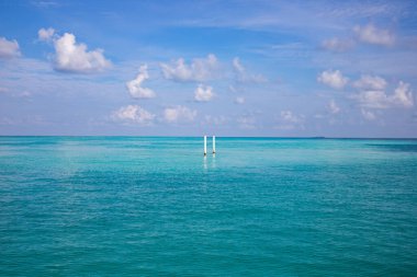 background of turquoise sea and blue sky