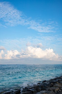 background of turquoise sea and blue sky