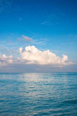 background of turquoise sea and blue sky
