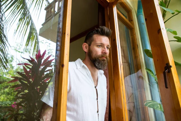 Handsome Man Looking Window Reflecting Tropical Plants Mental Health — Stock Photo, Image