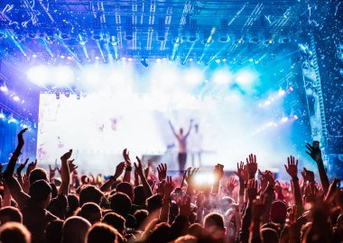 crowd partying stage lights live concert summer music festival
