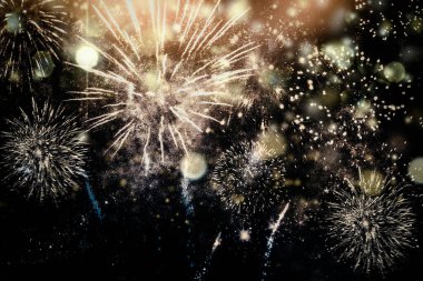 Bokeh ve havai fişekler bayram bayramı ya da yeni yıl arkaplanı