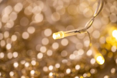 Altın bokeh Noel ışıkları arka planı