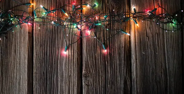 Červená Vánoční Světla Dřevěném Stole — Stock fotografie