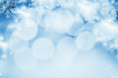 Noel ışıkları bulanık bokeh. Sihirli tatil soyut glitter arka plan yıldızlar yanıp sönen ve kar taneleri düşüyor.