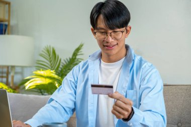 Happy cheerful businessman in home office.
