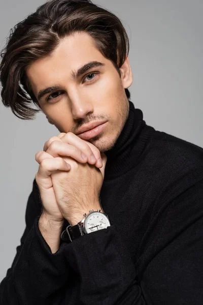 Young Good Looking Man Black Turtleneck Posing Clenched Hands Isolated — Stock Photo, Image
