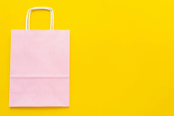 Top View Paper Shopping Bag Yellow Background Copy Space — Stock Photo, Image