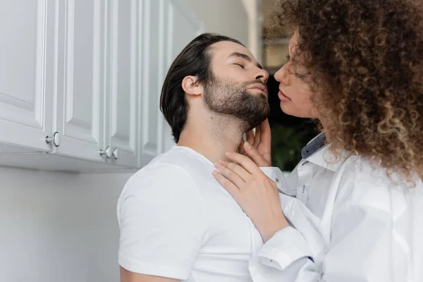Sexy Young Woman White Shirt Seducing Bearded Man Kitchen — Stockfoto
