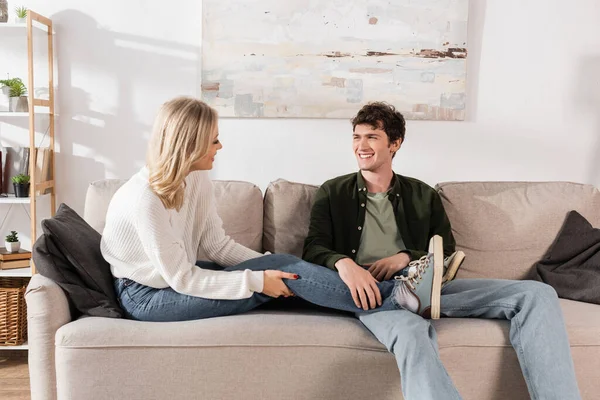 Full Length Cheerful Couple Jeans Looking Each Other Living Room — Foto de Stock