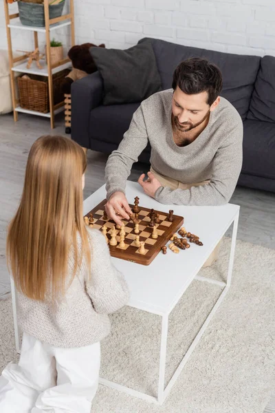 High Angle View Bearded Man Playing Chess Preteen Daughter Home —  Fotos de Stock