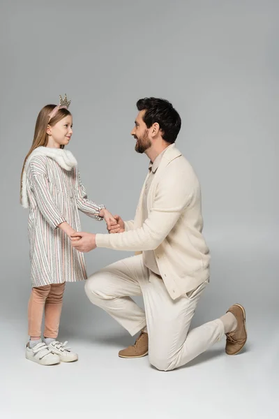 Full Length Happy Man Standing Knee Holding Hands Daughter Dress —  Fotos de Stock