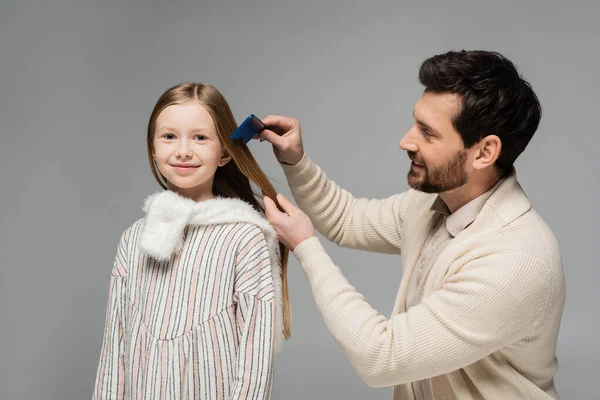 Happy Bearded Father Brushing Hair Smiling Daughter Isolated Grey —  Fotos de Stock