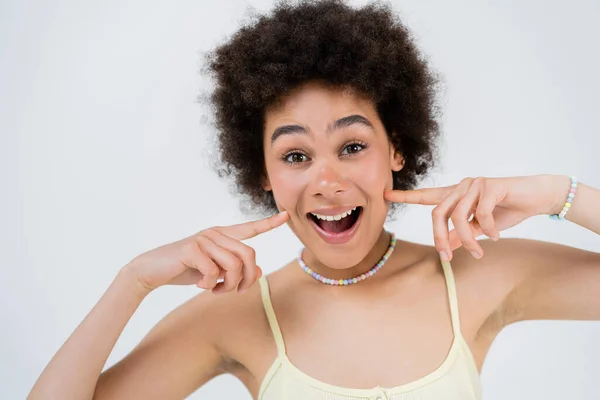 Emocionada Mujer Afroamericana Tocando Mejillas Aisladas Gris —  Fotos de Stock