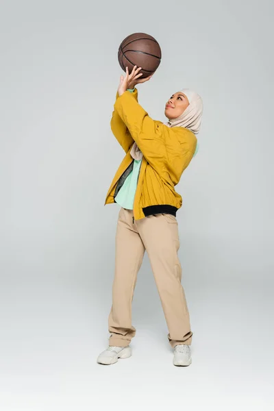 Full Length Young Multiracial Woman Hijab Yellow Bomber Jacket Playing — Stock Photo, Image