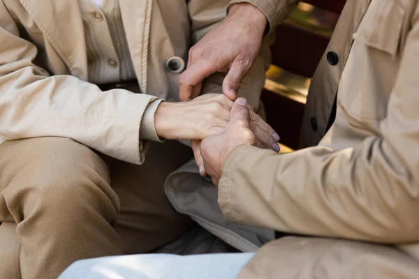 Cropped View Mature Couple Holding Hands While Sitting Bench Park — Stock Photo, Image
